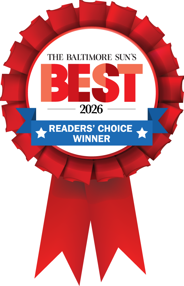 Award badge proclaiming 'The Baltimore Sun's BEST 2026 Readers' Choice Winner' with a red rosette and blue ribbon.